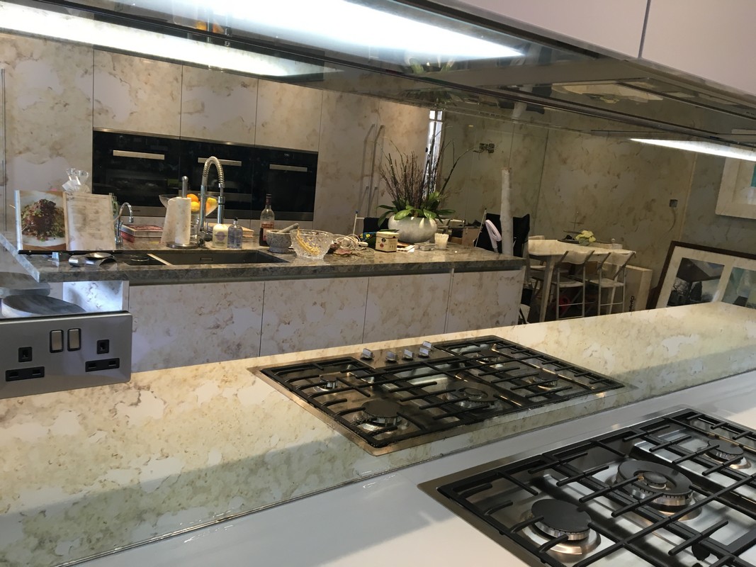 Mirror glass splashback in Pinner luxury kitchen