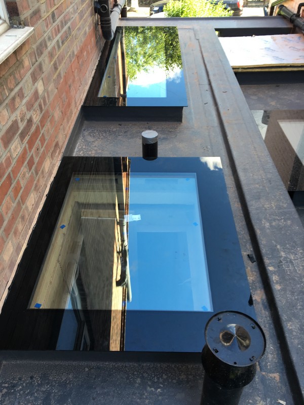 Multiple flat roof skylights on extension in Pinner